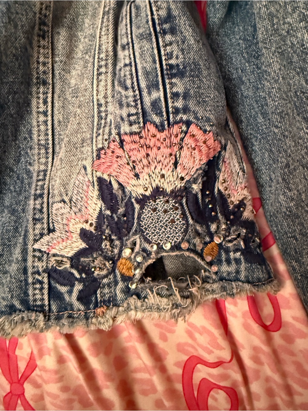 bebe Blue Distressed Denim Jacket with Embroidered Floral Accent - Picture 6 of 6